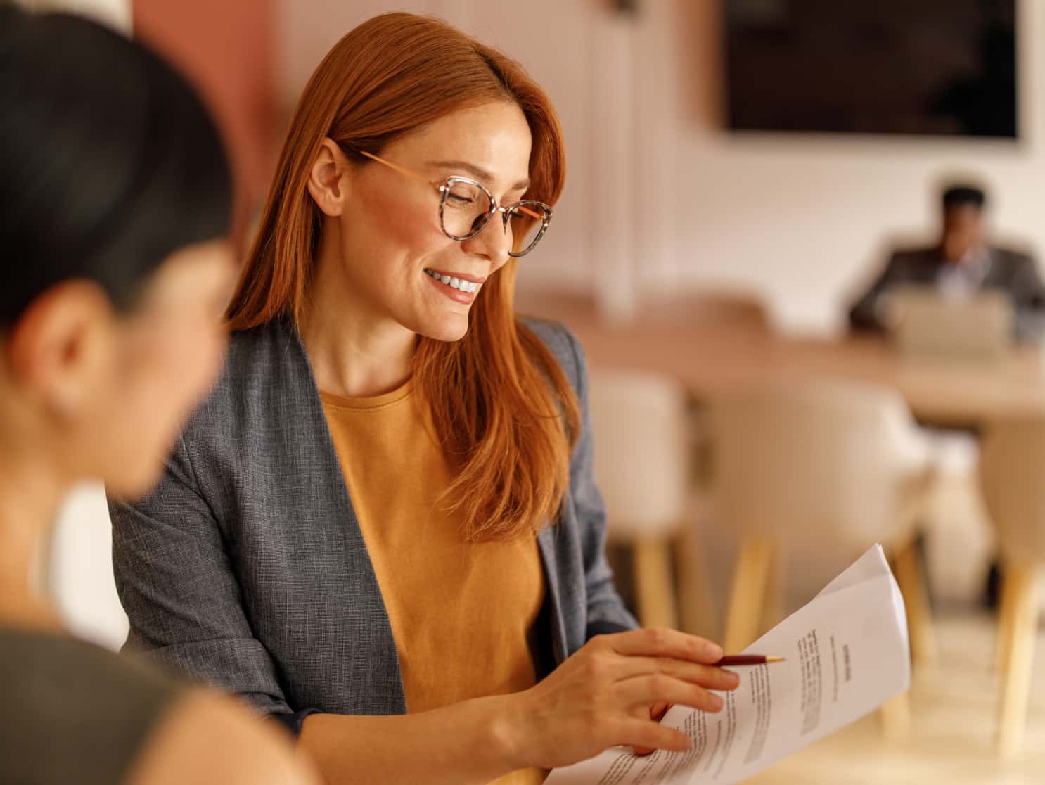 Broker walking a small-business client through voluntary dental plan options