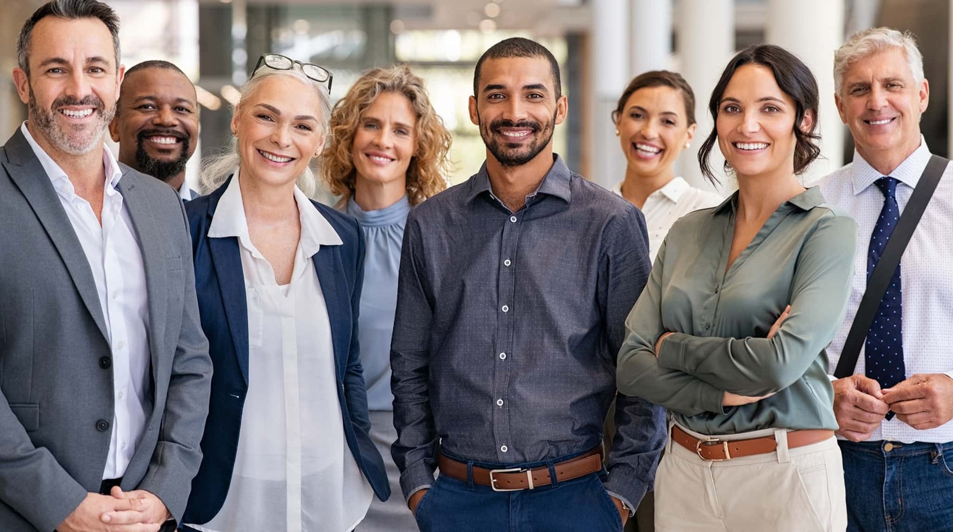 Business team posing together in a workplace